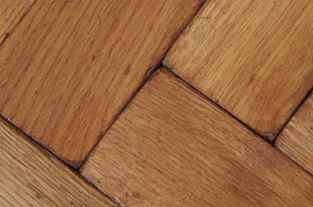 Distressed oak parquet flooring close up